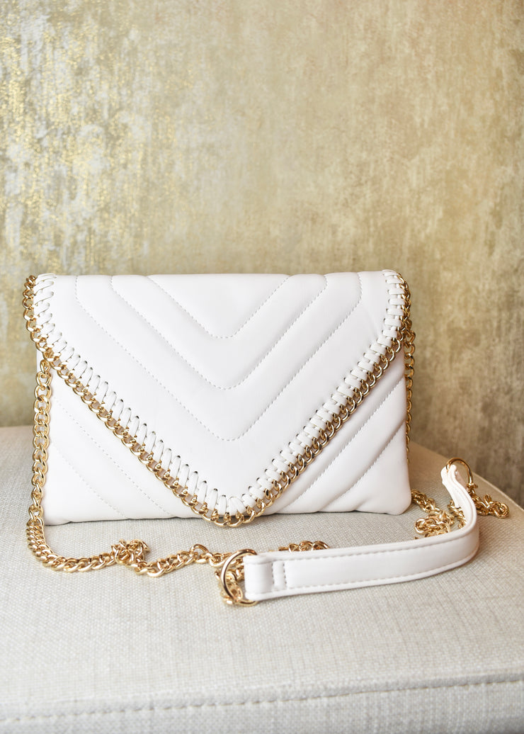 Light Switch Leather Quilted Clutch With Chain Edge